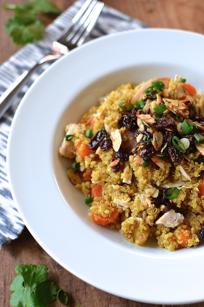 Moroccan Spiced Quinoa Bowls - Warm spices and a crunchy, chewy almond-raisin topping make this quinoa recipe perfect for lunch or a light dinner. ~sweetpeasandabcs.com