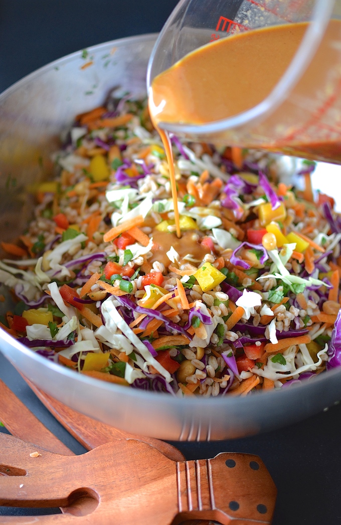 Rainbow Thai Farro Salad - Crunchy colorful veggies and chewy, nutty farro in a creamy Thai peanut dressing. A perfect vegetarian lunch or side dish! ~sweetpeasandabcs.com