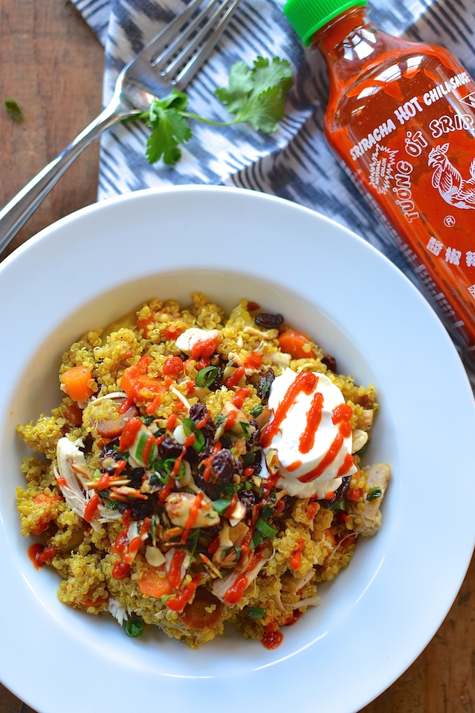Moroccan Spiced Quinoa Bowls - Warm spices and a crunchy, chewy almond-raisin topping make this quinoa recipe perfect for lunch or a light dinner. ~sweetpeasandabcs.com