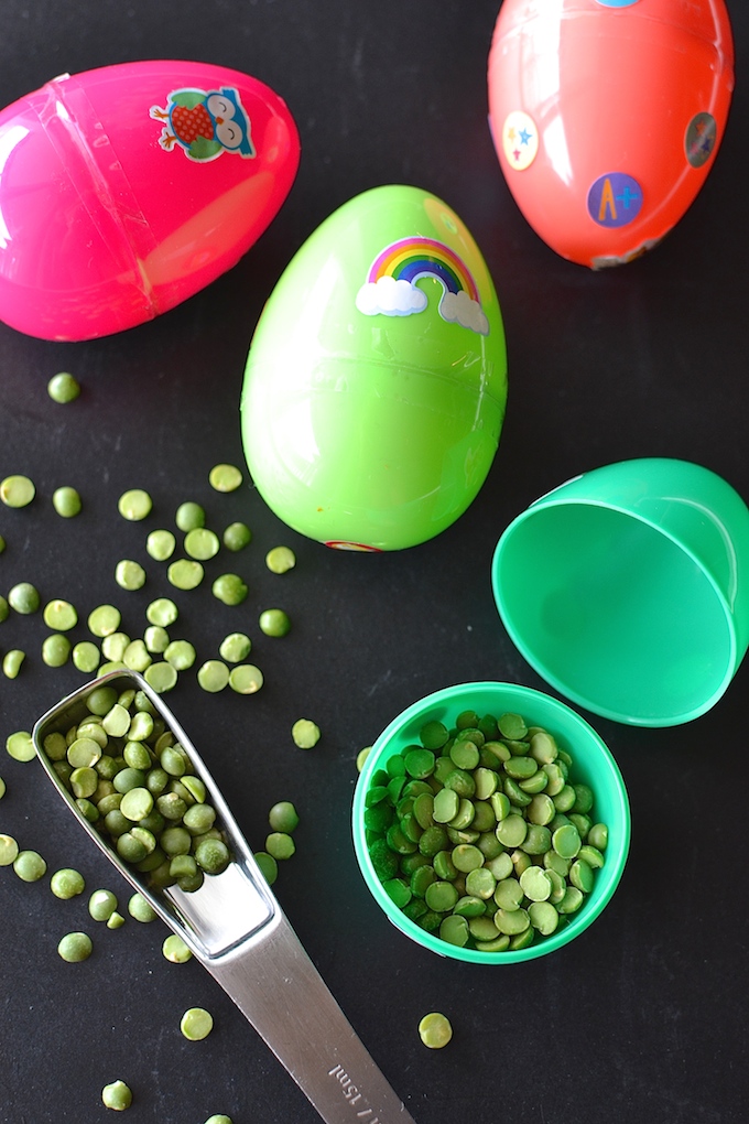 Make Your Own Musical Egg Shakers - Make your own musical egg shakers using plastic Easter eggs and split peas! ~sweetpeasandabcs.com