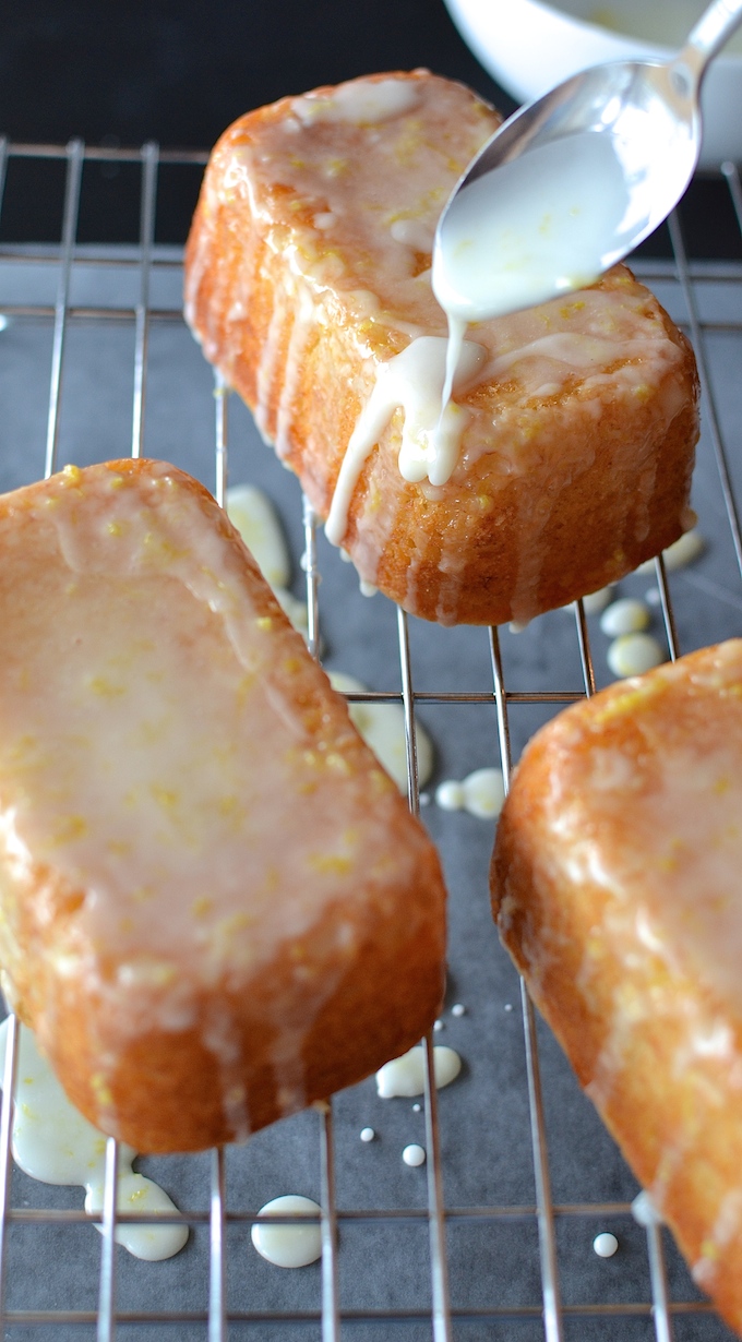 Little Lemon Loaves - Soft, moist and sweet, these Little Lemon Loaves are egg-free and drizzled with a sweet-and-sour, lemony glaze. A great recipe for a light dessert or afternoon treat! ~sweetpeasandabcs.com