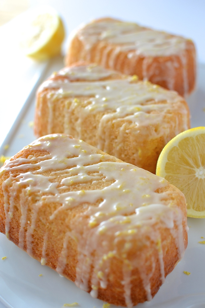 Little Lemon Loaves - Soft, moist and sweet, these Little Lemon Loaves are egg-free and drizzled with a sweet-and-sour, lemony glaze. A great recipe for a light dessert or afternoon treat! ~sweetpeasandabcs.com