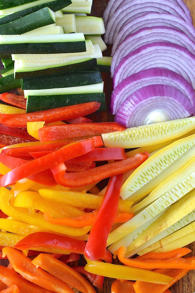 Quick Veggie Fajitas - Fresh and colorful peppers, onions, zucchini and squash are flavored simply and nestled in a warm tortilla in this quick 30-minute dinner recipe. ~sweetpeasandabcs.com