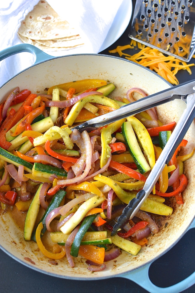 Quick Veggie Fajitas - Fresh and colorful peppers, onions, zucchini and squash are flavored simply and nestled in a warm tortilla in this quick 30-minute dinner recipe. ~sweetpeasandabcs.com