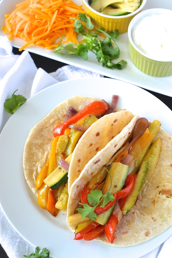 Quick Veggie Fajitas - Fresh and colorful peppers, onions, zucchini and squash are flavored simply and nestled in a warm tortilla in this quick 30-minute dinner recipe. ~sweetpeasandabcs.com