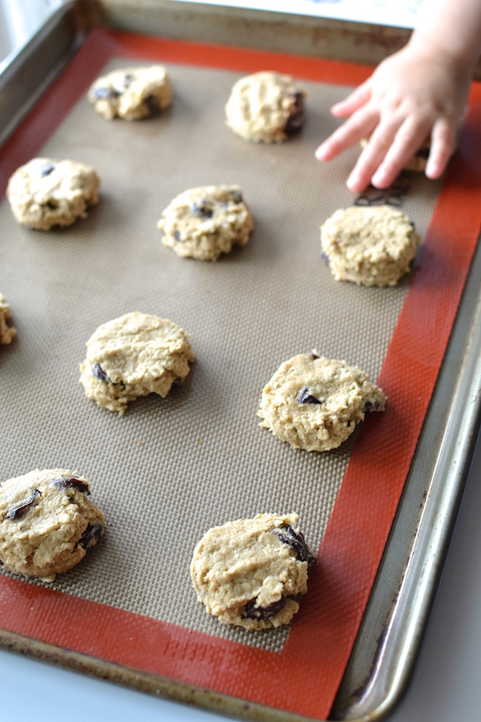 Making Cherry Oatmeal Cookies - An egg-free version of a cookie classic, studded with tart, dried cherries! ~sweetpeasandabcs.com