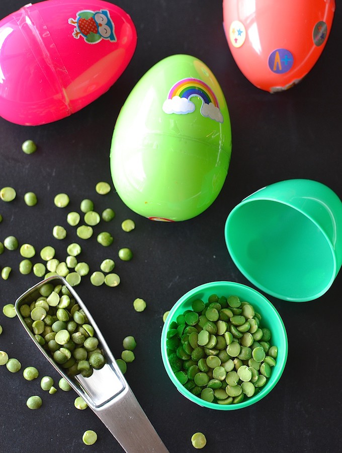 Making Music: Egg Shakers - Make your own musical egg shakers using plastic Easter eggs and split peas! ~sweetpeasandabcs.com