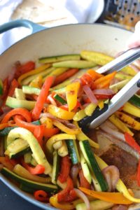 Quick Veggie Fajitas - Fresh and colorful peppers, onions, zucchini and squash are flavored simply and nestled in a warm tortilla in this quick 30-minute dinner recipe. ~sweetpeasandabcs.com