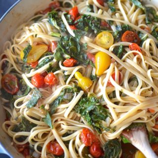 Pasta with Greens and Balsamic Tomatoes - Late summer tomatoes and fall's bountiful greens star in this easy, weeknight pasta dish! ~sweetpeasandabcs.com