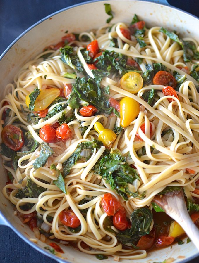 Pasta with Greens and Balsamic Tomatoes - Late summer tomatoes and fall's bountiful greens star in this easy, weeknight pasta dish! ~sweetpeasandabcs.com